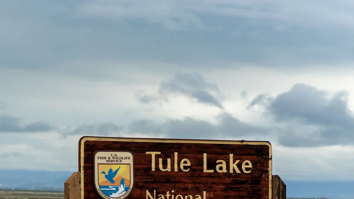Tule Lake National Wildlife Refuge entrance sign and open wetlands