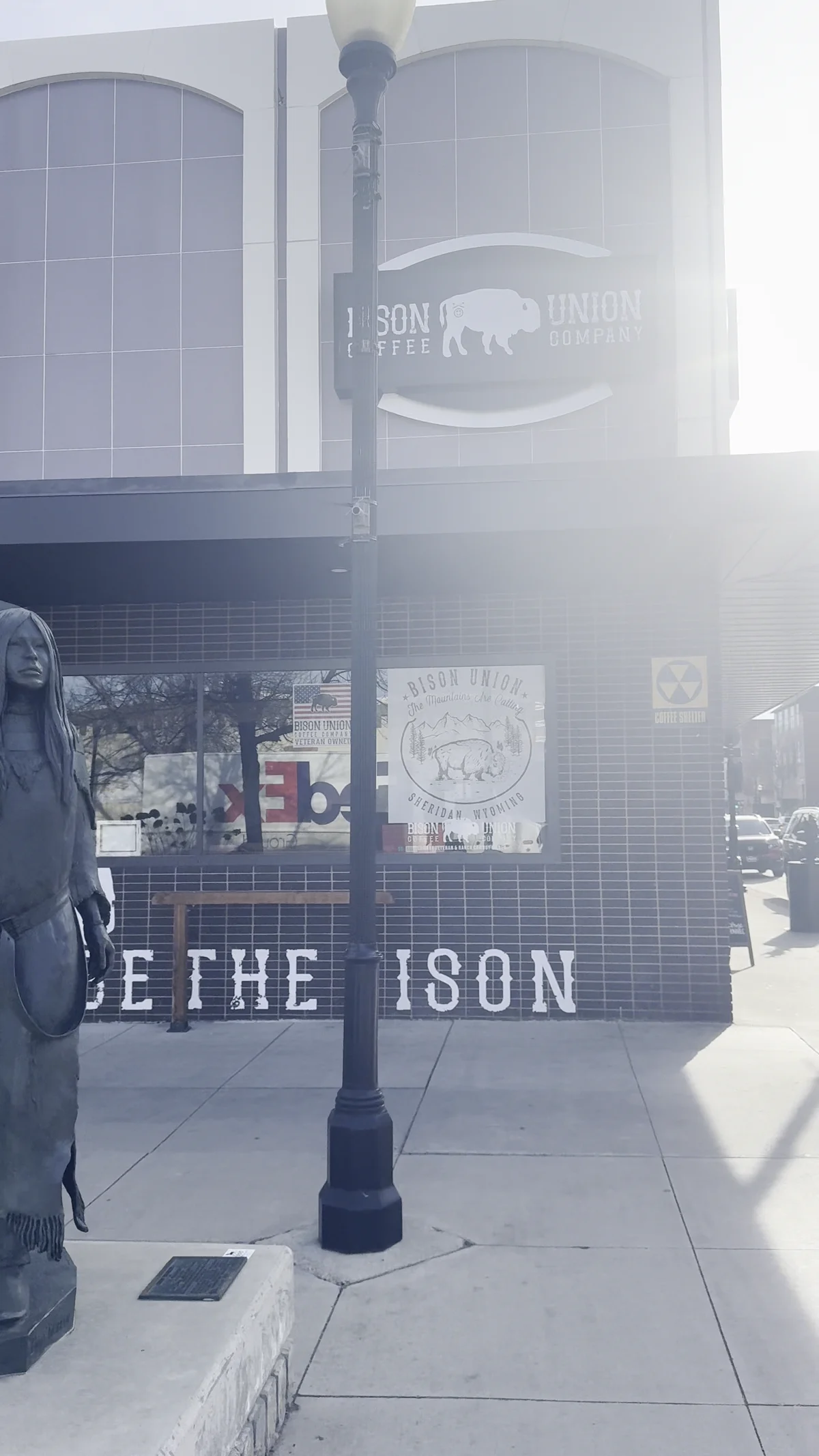 Public sculpture and downtown shop frontage in Sheridan