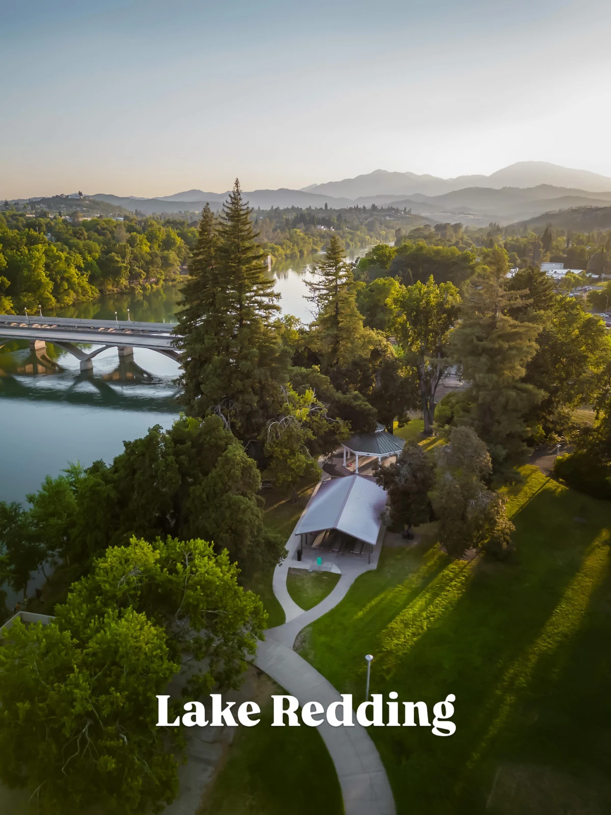Trees, river, and parkland at Lake Redding