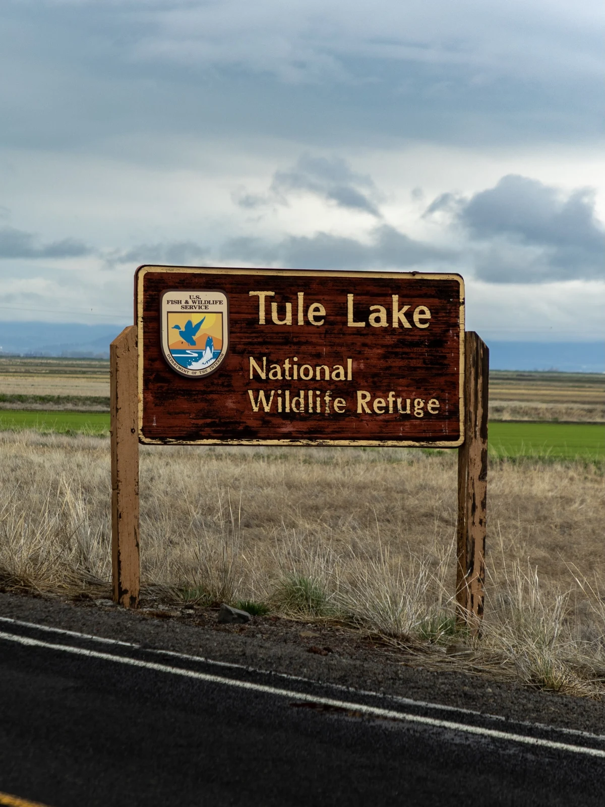 Tule Lake National Wildlife Refuge entrance sign and open wetlands